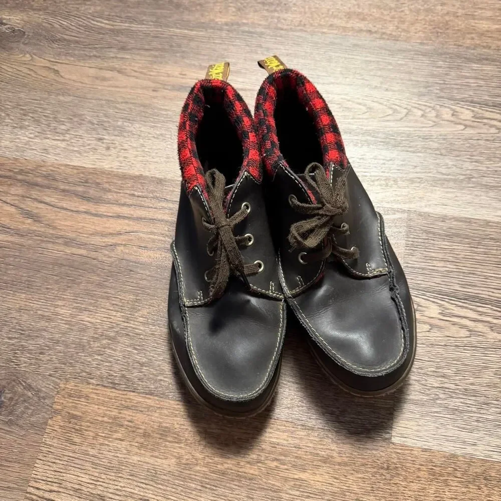 Dr. Martens black leather lace up boots with red/black plaid lining, size US 10
